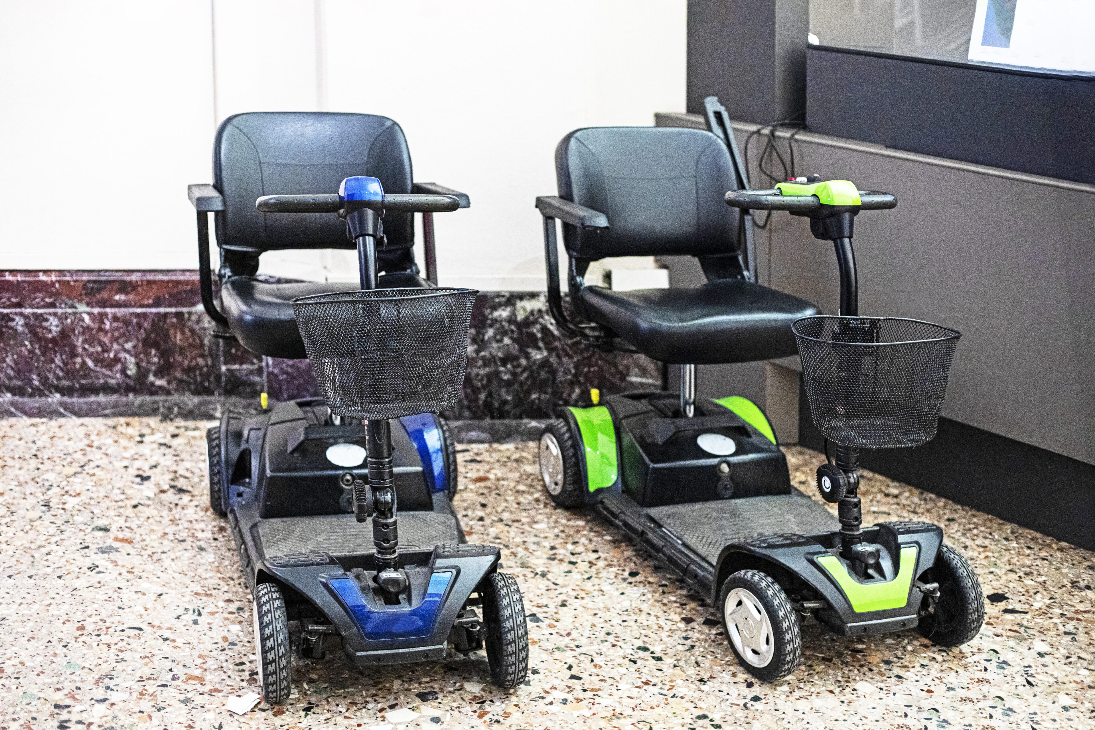 wheelchairs for people with limited mobility in museums. care for pensioners and people with sore legs wheelchairs for people with limited mobility in museums. care for pensioners and people with sore legs